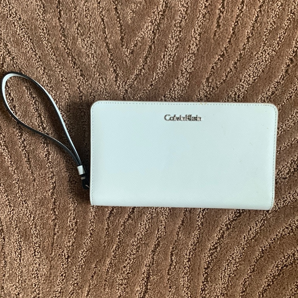 Calvin Klein zipped, light blue wallet/wristlet.